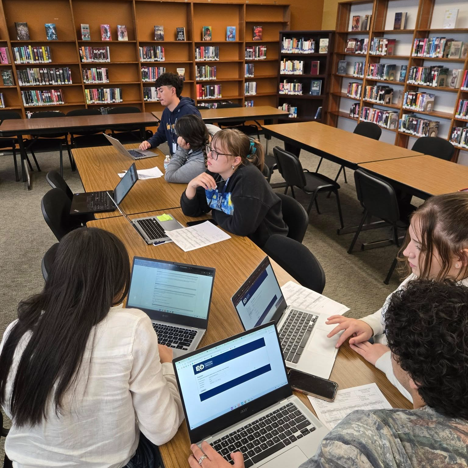 Students in library on laptops